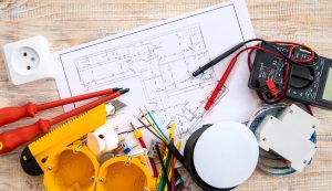 Equipment and schematic used by electrical contractors | Featured image for Questions to Ask an Electrical Contractor Before Employing Them Blog for Latched Electrical Solutions.